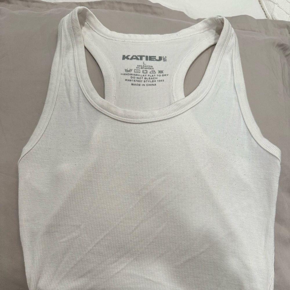 Gently used white Katie J NYC tank size L juniors
